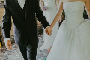 Photograph of couple considering the pros and cons of prenuptial agreements